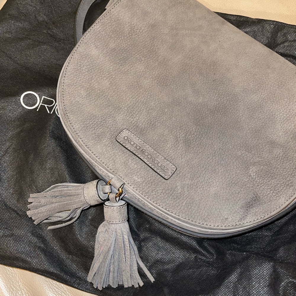 Large grey Crossbody with flap and strap!